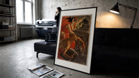 Woman leading revolutionaries with red flag print in a slim black frame leaning on a dark sofa in a concrete print studio