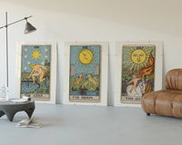 Three 1909 tarot cards three-panel set displayed beside a brown leather sofa