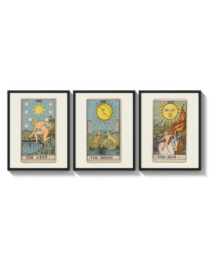 Three 1909 tarot cards three-panel set arranged as a triptych on a bright gallery wall