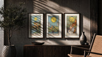 Three 1909 tarot cards triptych in three walnut frames above a sideboard in a warm room