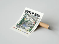 Rolled Super Nintendo game console with controller poster beside its crush-resistant kraft shipping tube