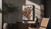 Swirl Manicure with a Heart Ring poster framed above a fluted sideboard beside a potted tree