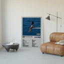 SZA SOS Album Tracklist poster framed above a tan leather living-room couch