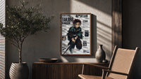 Anime boy wielding katana sword poster framed above a fluted sideboard beside an olive tree