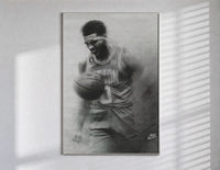 Basketball player celebrating with ball poster in a slim frame on a bright wall with soft window light