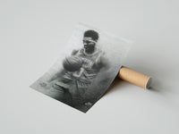 Rolled Basketball player celebrating with ball poster beside its crush-resistant kraft shipping tube