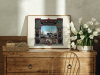 Victorian perfumers advertisement with harbor scene print in an oak frame on a farmhouse dresser beside white tulips