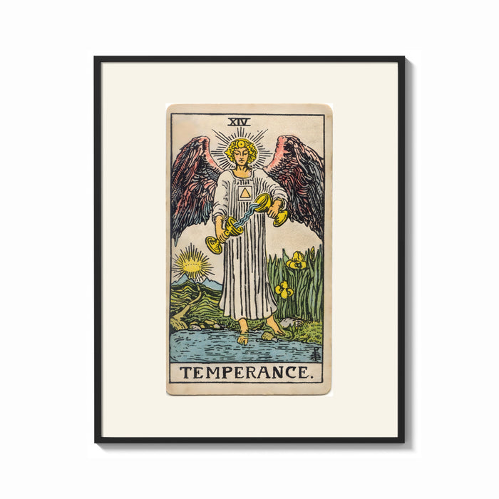 Framed Winged angel pouring water between cups print shown as a bold statement piece on a clean gallery wall