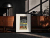 Black-framed Ten Swords Tarot card print on a moody console with designer coffee-table books