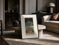 Ten Swords Tarot card print in a black frame leaning on a travertine table in a sunlit lounge