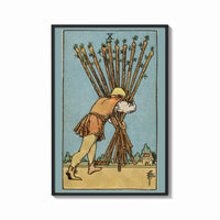Framed Ten of Wands print shown as a bold statement piece on a clean gallery wall