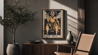 The Devil poster framed above a fluted sideboard beside a potted tree