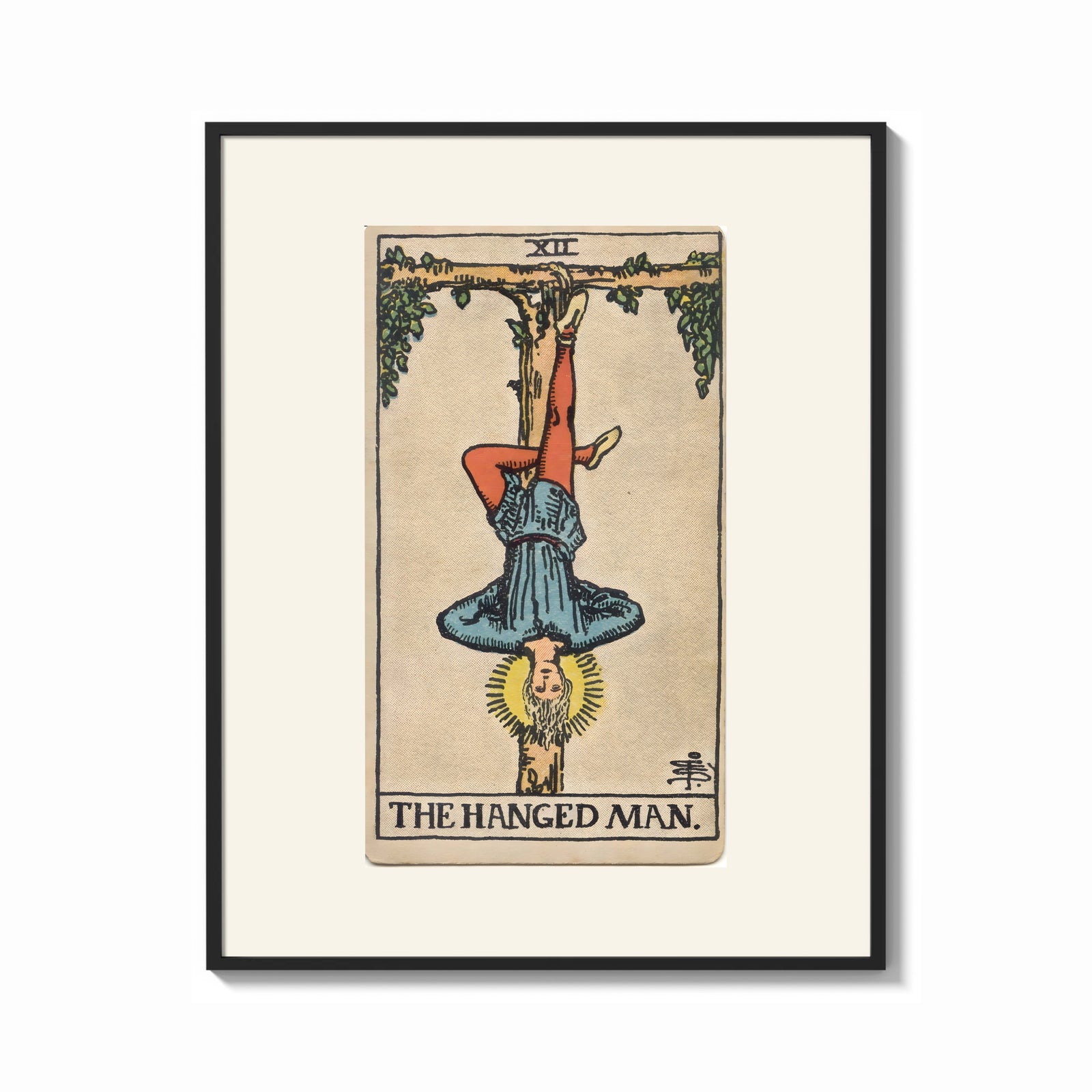 Framed Man hanging upside down from tree print shown as a bold statement piece on a clean gallery wall