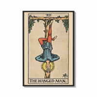 Framed The Hanged Man print shown as a bold statement piece on a clean gallery wall