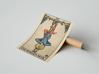 Gently curled The Hanged Man print beside its protective shipping tube