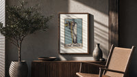 Cloaked hermit holding lantern and staff poster framed above a fluted sideboard beside an olive tree
