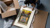 The Lovers tarot card framed print being unpacked from protective bubble wrap and a box