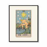 Framed The Star tarot card figure print shown as a bold statement piece on a clean gallery wall