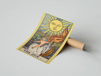 Gently curled The Sun print beside its protective shipping tube