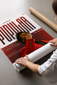 The Weeknd Popular Idol Magazine Cover poster being unrolled on a concrete floor