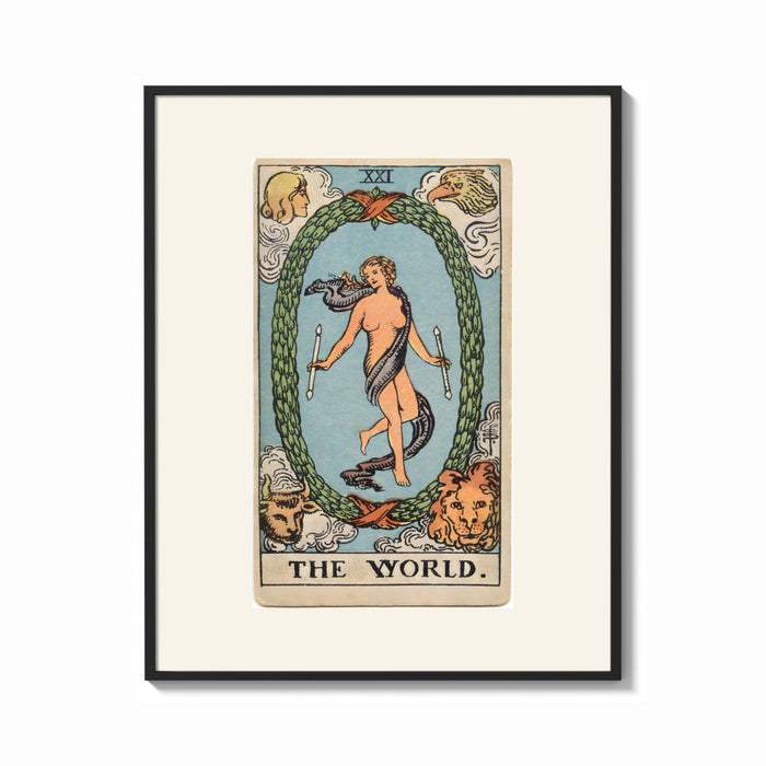 Framed The World tarot card figure print shown as a bold statement piece on a clean gallery wall
