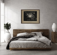 Santa Claus meeting Punch at fireplace print in a dark wood frame above a rattan bed on a plaster wall