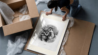 Santa Claus hugged by young child framed print being unpacked from protective bubble wrap and a box