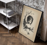 Curly-haired child's head with holly wreath poster in a black frame leaning beside a shelf in a raw-plaster loft