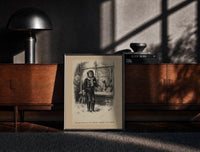 Black-framed Crying boy outside toy shop window print on a moody console with designer coffee-table books