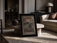 Santa in sleigh and figure riding goose print in a black frame leaning on a travertine table in a sunlit lounge