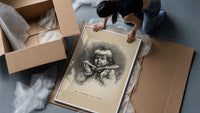 Child's face as Christmas plum pudding framed print being unpacked from protective bubble wrap and a box