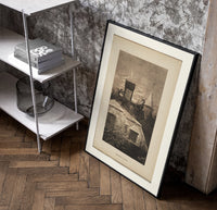 Santa Claus in sleigh on rooftop poster in a black frame leaning beside a shelf in a raw-plaster loft