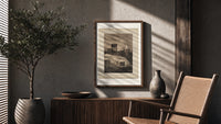 Santa Claus in sleigh on rooftop poster framed above a fluted sideboard beside an olive tree
