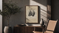 Two top-hatted men with parcels poster framed above a fluted sideboard beside an olive tree