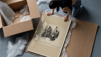 Two top-hatted men with parcels framed print being unpacked from protective bubble wrap and a box
