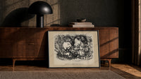 Two sleeping children's heads dreaming of Christmas print in a black frame leaning against a walnut console in lamplight