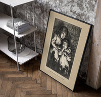 Two young children in nightgowns poster in a black frame leaning beside a shelf in a raw-plaster loft