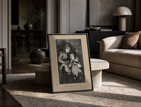 Two young children in nightgowns print in a black frame leaning on a travertine table in a sunlit lounge