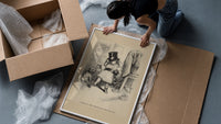Small child trying on oversized top hat framed print being unpacked from protective bubble wrap and a box