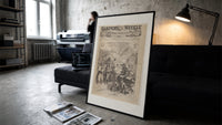 Santa Claus visiting Union army camp print in a slim black frame leaning on a dark sofa in a concrete print studio