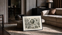 Santa Claus Christmas montage engraving print in a slim black frame leaning on a travertine coffee table