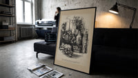 Child awake in bed on Christmas Eve print in a slim black frame leaning on a dark sofa in a concrete print studio