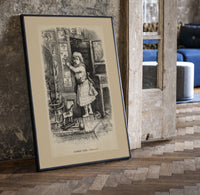 Small child reaching toward nursery wall tiles print in a black frame leaning beside a vintage door on parquet