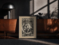 Black-framed Two children awaiting Santa Claus on Christmas print on a moody console with designer coffee-table books