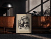 Black-framed Children leaving gifts for Santa Claus print on a moody console with designer coffee-table books