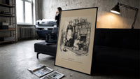 Children leaving gifts for Santa Claus print in a slim black frame leaning on a dark sofa in a concrete print studio