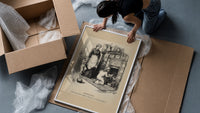 Children leaving gifts for Santa Claus framed print being unpacked from protective bubble wrap and a box