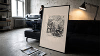 Santa Claus giving gifts to Union soldiers print in a slim black frame leaning on a dark sofa in a concrete print studio
