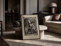 Santa Claus reading letters at desk print in a black frame leaning on a travertine table in a sunlit lounge