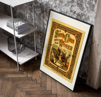 Santa Claus sewing doll clothes in workshop poster in a black frame leaning beside a shelf in a raw-plaster loft